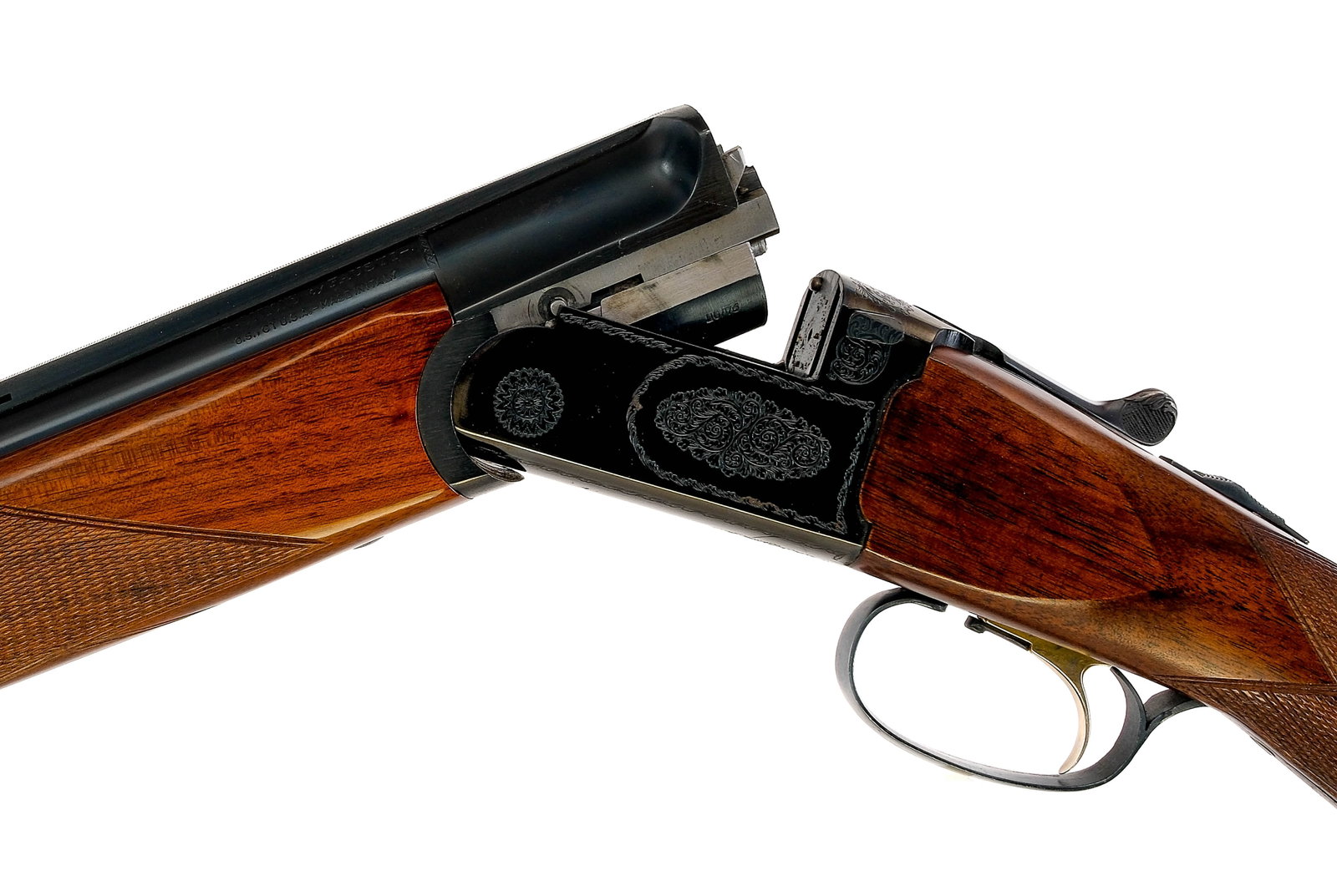 Traditions Fausti Upland II 20Ga O/U Shotgun: Description Traditions Fausti Upland II in 20 gauge with a two round capacity and a 26" over under top rib vented barrel. Made in Italy. Top barrel has a MOD and bottom a SKEET 628 removable choke. Bl