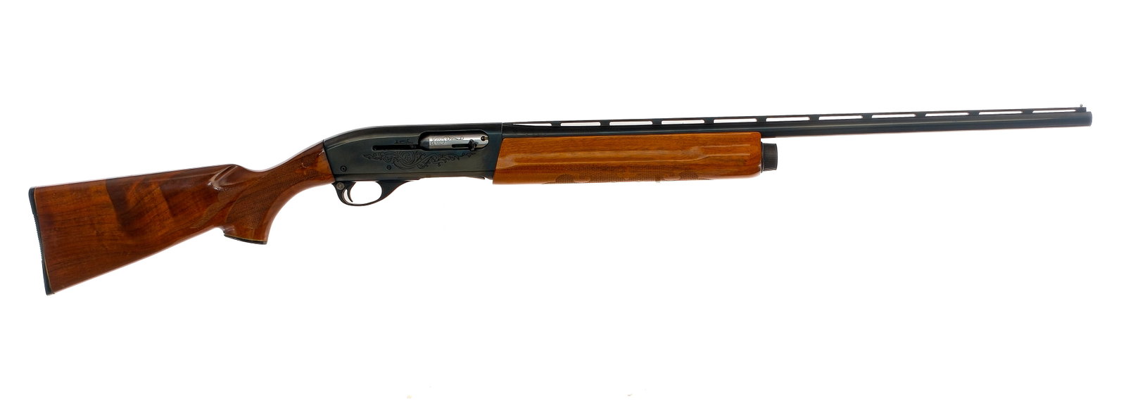 Remington 1100 20Ga Semi Auto Shotgun: Description Remington 1100 in 20 gauge 2 3/4" with a three round capacity and a 25.5" IMP CYL fixed choke top rib vented barrel. Serrated composite butt plate. Checkered wood stock and front forend. B