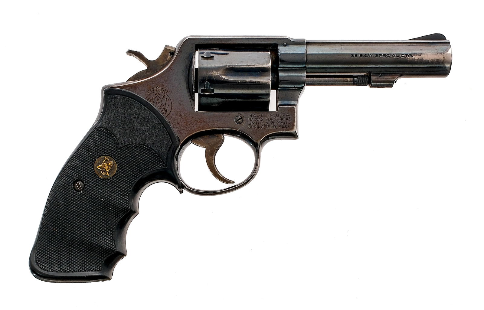 Smith & Wesson 10-6 .38 S&W Spl Revolver: Description Smith & Wesson Model 10-6 in .38 S&W Special with a six round capacity and a 4" barrel. Checkered rubber Pachmayr grips. Blued frame, cylinder and barrel. Case colored serrated trigger and