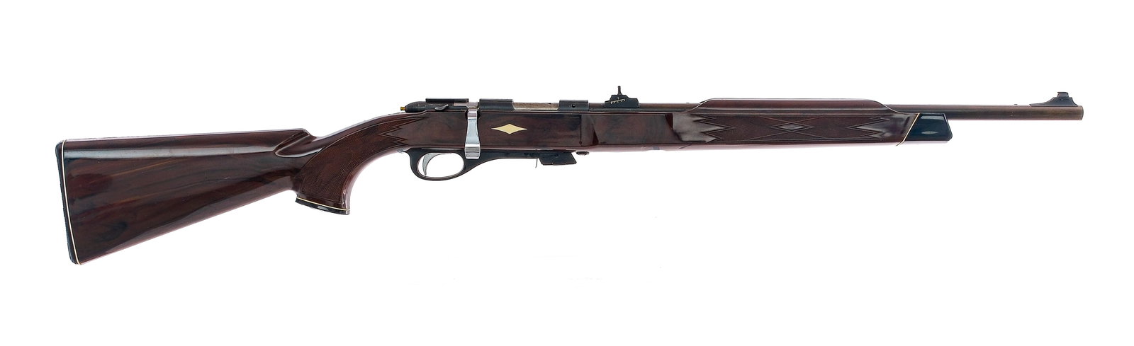Remington Nylon 11 .22 S,L,LR Bolt Action Rifle: Description Remington Nylon 11 chambered in .22 short, long, and long rifle with one removable magazine and a 19 5/8" barrel. Patinated blued barrel and receiver. The top of the receiver is grooved fo