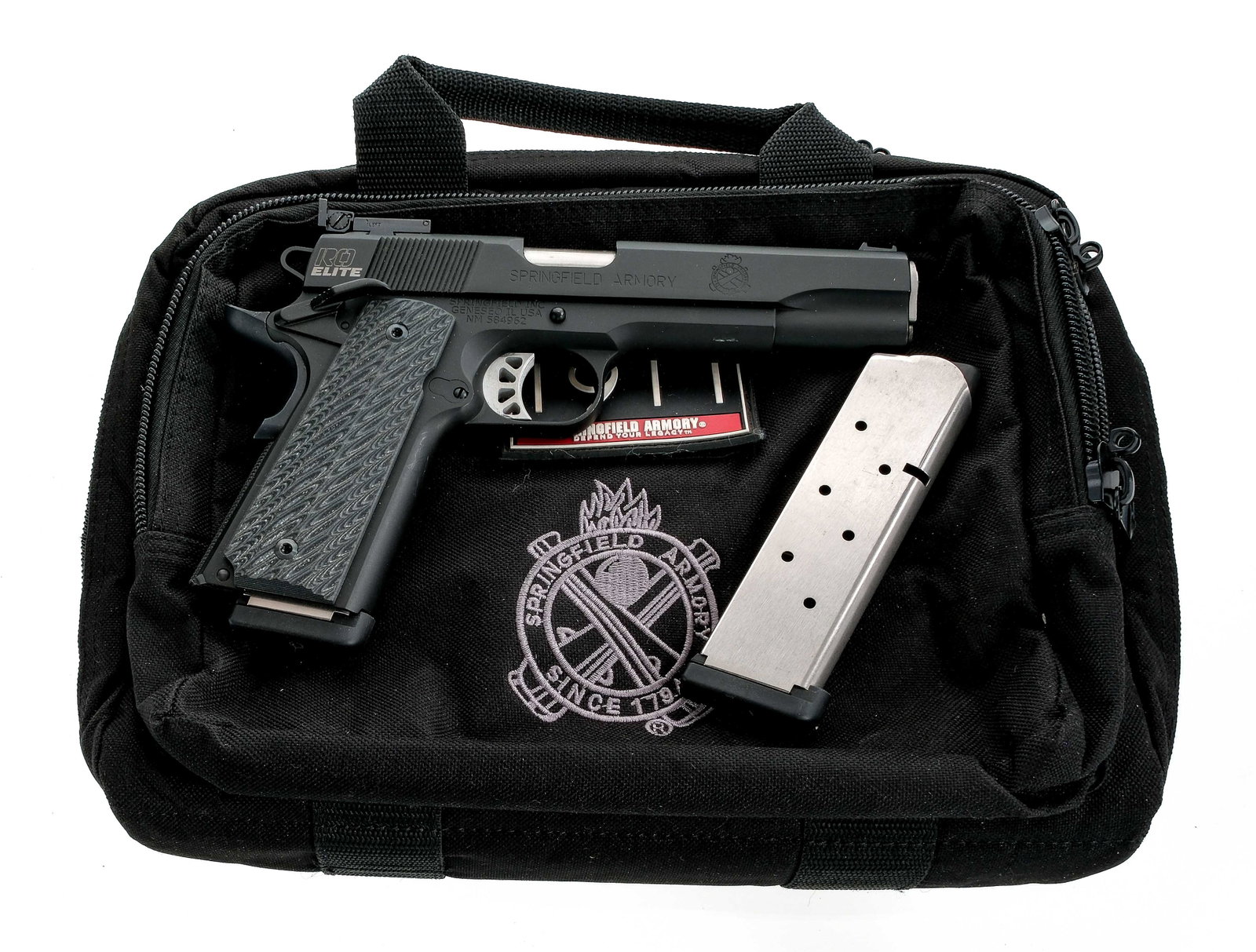 Springfield Armory 1911-A1 RO Elite .45 ACP Pistol: Description UPDATE: Pistol Caliber is 9mm.Springfield Armory 1911-A1 RO Elite chambered in .45 ACP with two, eight round removable magazines and a 5" stainless barrel. Black finished steel frame with 