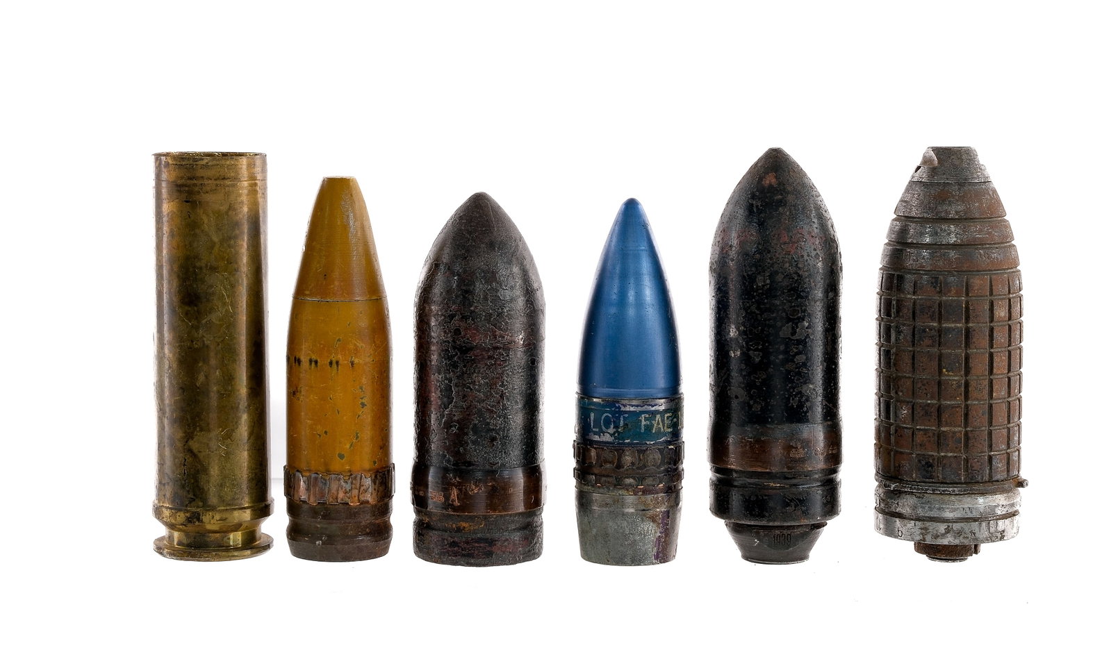 De-Milled Ordnance 6 Pcs Lot Ordnance: Description De-Milled ordnance/munitions lot with six assorted pieces. Two German shells with Waffenamt proofs Wa330, Wa216 and one marked 1939. One small brass shell marked on the headstamp: JT 97 02