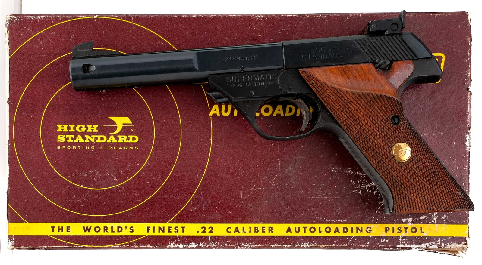 High Standard Supermatic Citation .22 LR Pistol: Description High Standard Supermatic Citation Model 104 in .22 Long Rifle with one, ten round removable magazine and a 5.5" heavy Bull Barrel. Checkered wood grip plates with left side thumb rest. Blu