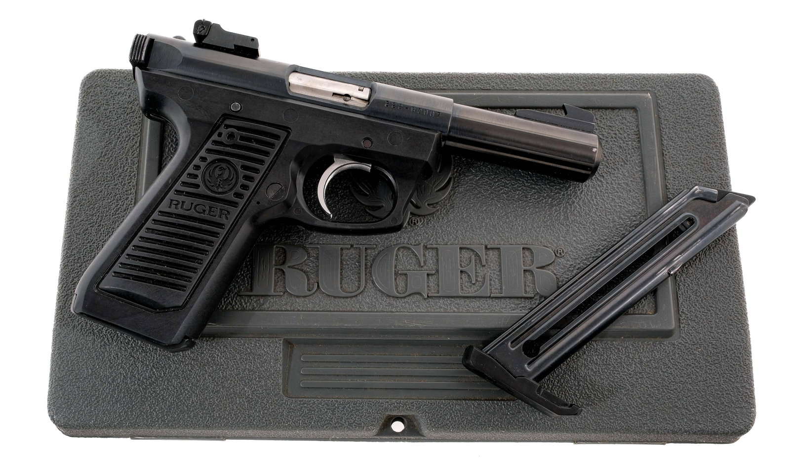 Ruger 22/45 .22 LR Semi Auto Pistol: Description Ruger Model 22/45 in .22 Long Rifle with two, ten round removable magazines and a 4" bull barrel. Serrated composite grip on frame. Silver finished serrated composite trigger. Blued chargi
