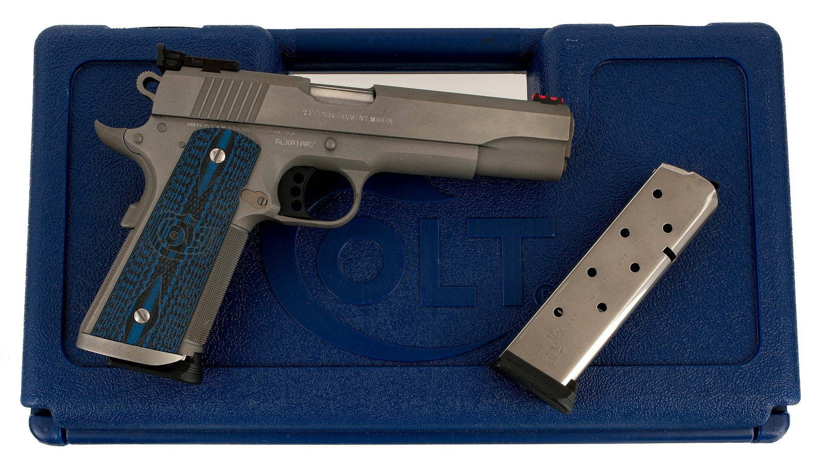 Colt Gold Cup Trophy .45 Semi Auto Pistol: Description Colt Government Model 1911 Gold Cup Trophy in .45 ACP with two, eight round removable magazines and a 5" barrel. Blue laminated composite Colt Logo G10 grip plates. Stainless steel frame, 