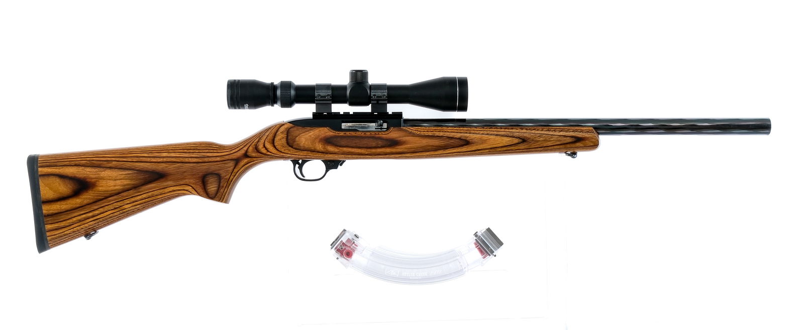 Ruger 10/22 .22 Long Rifle Semi Auto Rifle: Description Ruger 10/22 chambered in .22 long rifle with three magazines and a 20" Ruger Hammer Forged heavy bull barrel. One of the magazines is a ten round Ruger rotary magazine and the other two ar