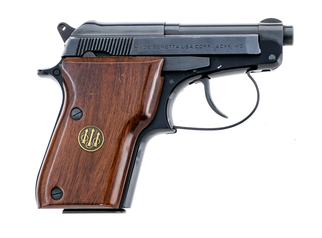 Beretta 21A "BobCat" .22 LR Semi Auto Pistol: Description Beretta 21A "BobCat" chambered in .22 long rifle with one, seven round removable magazine and a 2.5" tip up barrel. Black finished alloy frame with smooth wood grips. Grip mounted push but