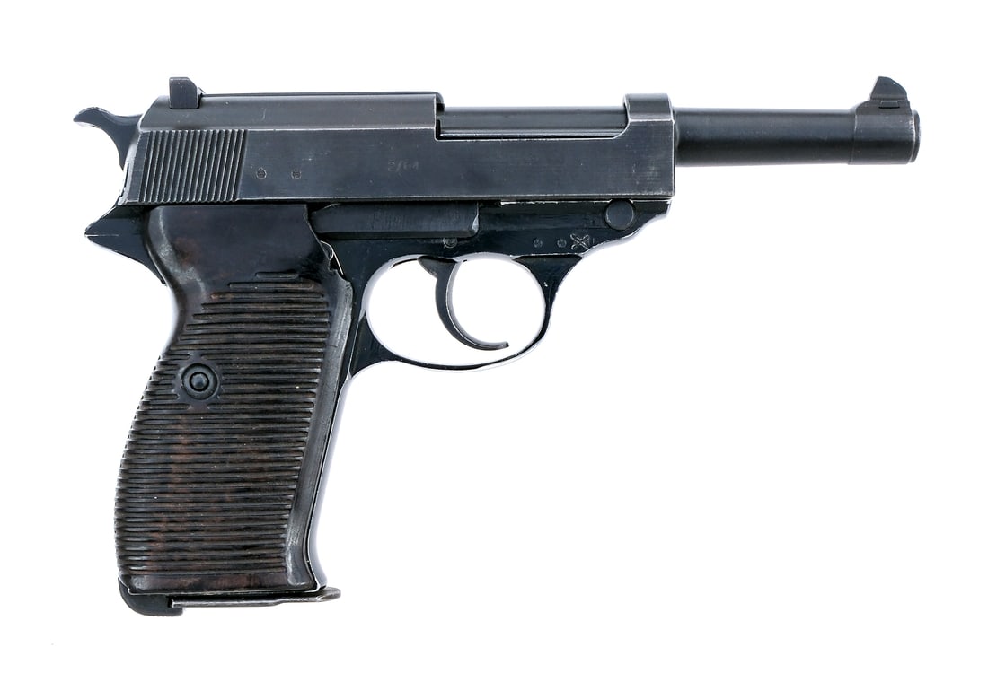 Walther P1 9mm Semi Auto Pistol: Description Walther P1 in 9mm with one, eight round removable magazine and a 5" barrel. Serrated composite grip plates. Blued alloy frame. Blued trigger, hammer, serrated slide and barrel. Magwell loc