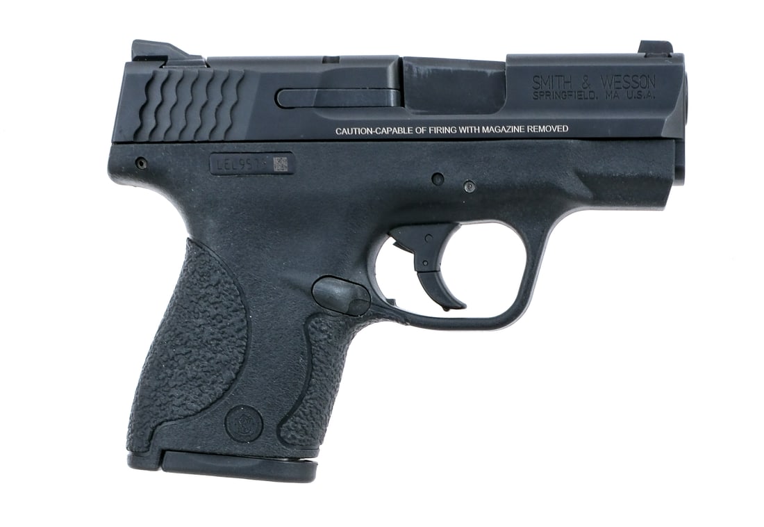 Smith & Wesson M&P 9 Shield 9mm Semi Auto Pistol: Description Smith & Wesson M&P 9 Shield in 9mm with one, seven round removable magazine and a 3.25" barrel. Textured black composite grip on frame. Black composite trigger. Blued serrated slide and ba