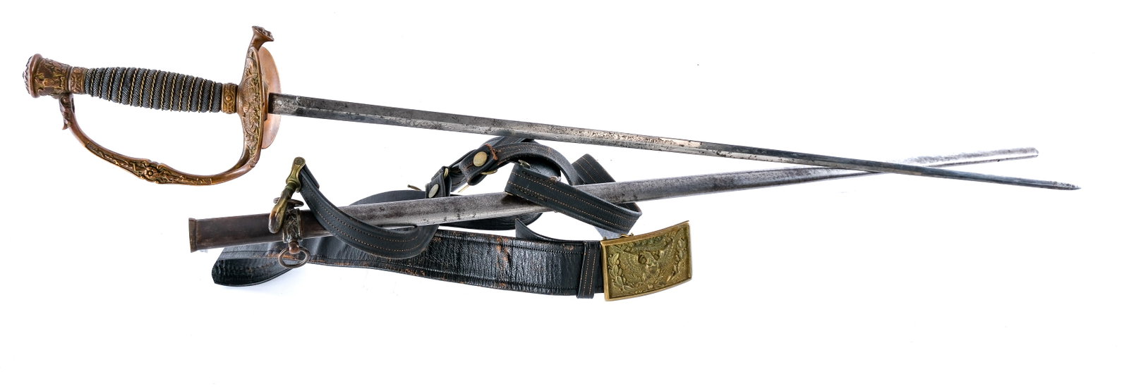 U.S. Army 1860 Staff & Field Officers Sword: Description U.S. Army Model 1860 Staff & Field Officers Sword with leather belt and brass belt buckle. Brass hand guard. Wire wrapped ray skin or shark skin wrapped hand grip. 29" etched blade with me