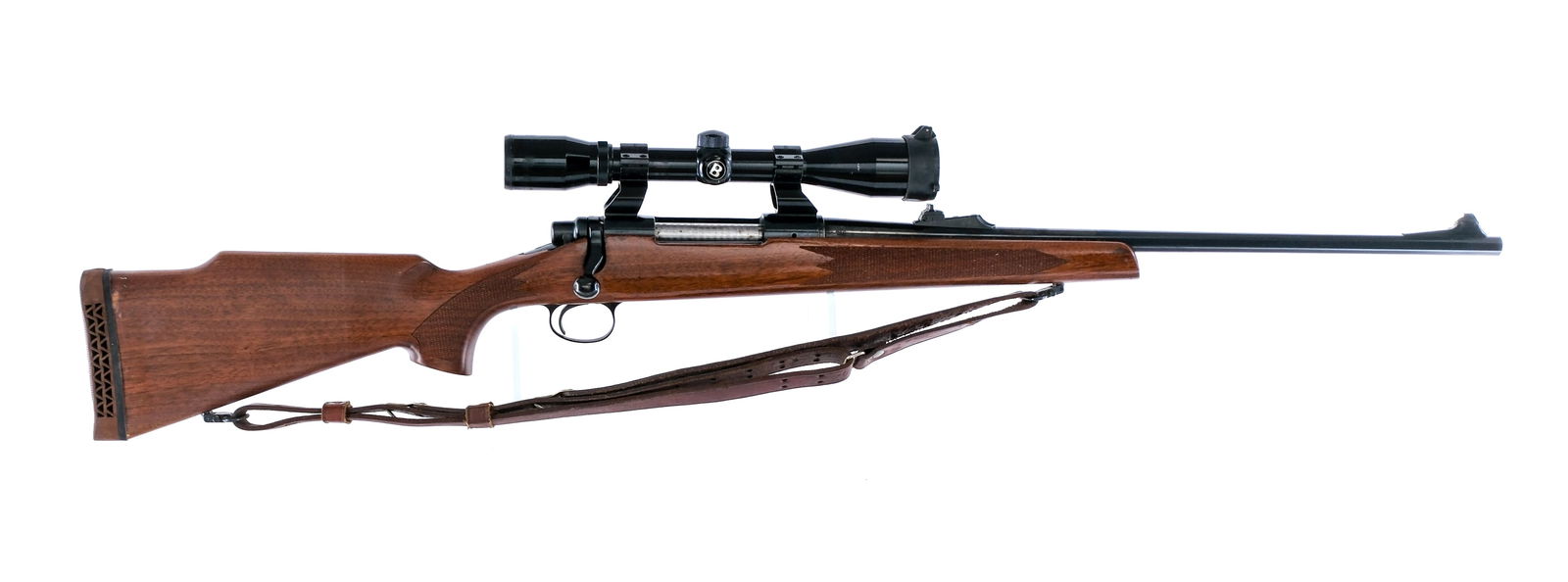 Remington 700 .30-06 Bolt Action Rifle: Description Remington Model 700 in .30-06 Springfield with a five round capacity and a 22" barrel. Made in Ilion New York. Blued finish with checkered Monte Carlo stock. Rubber recoil pad. Mounted lea