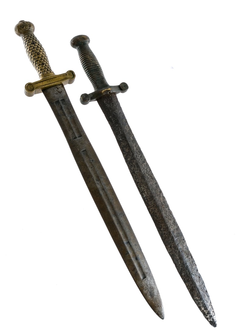 Artillery Swords 2Pcs Lot Sword: Description This lot is for two artillery swords. French Model 1831 Artillery Short Sword with a 18.5" double side blade. Brass serrated hand guard and pommel. Illegible maker marked with the number: 