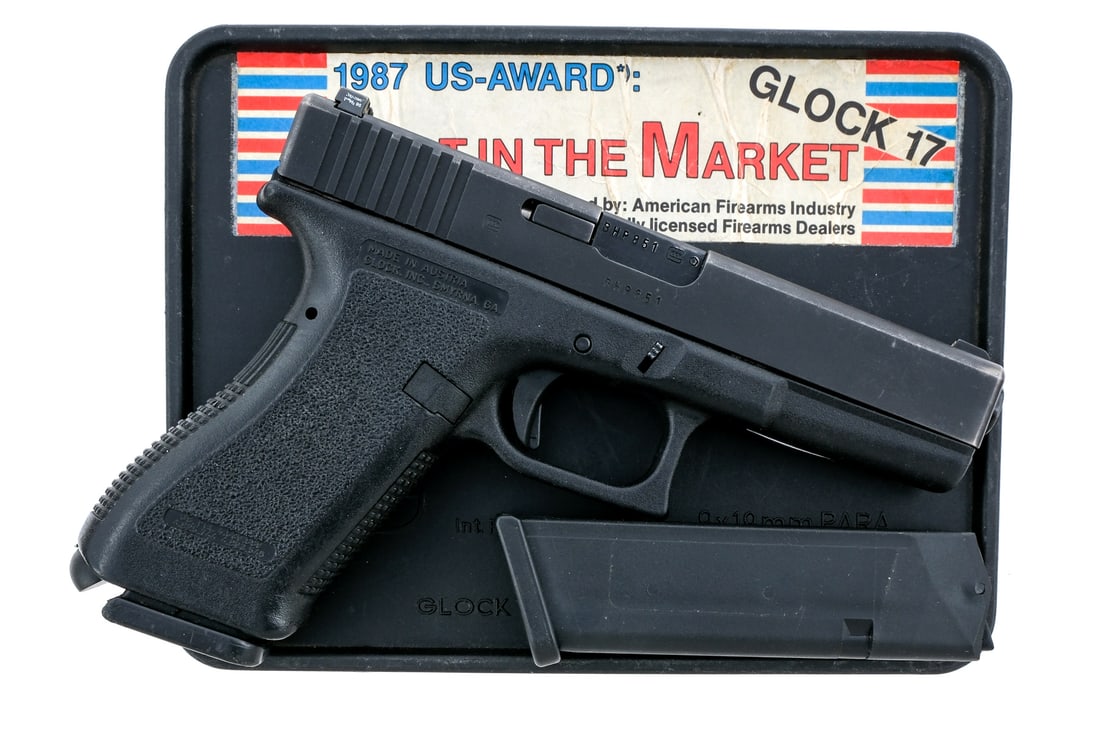 Glock 17 Gen 2 9mm Semi Auto Pistol: Description Second Generation Glock 17 chambered in 9mm with two removable magazines and a 4.49" barrel. One magazine is seventeen round and the other is ten rounds. Textured polymer frame with serrat
