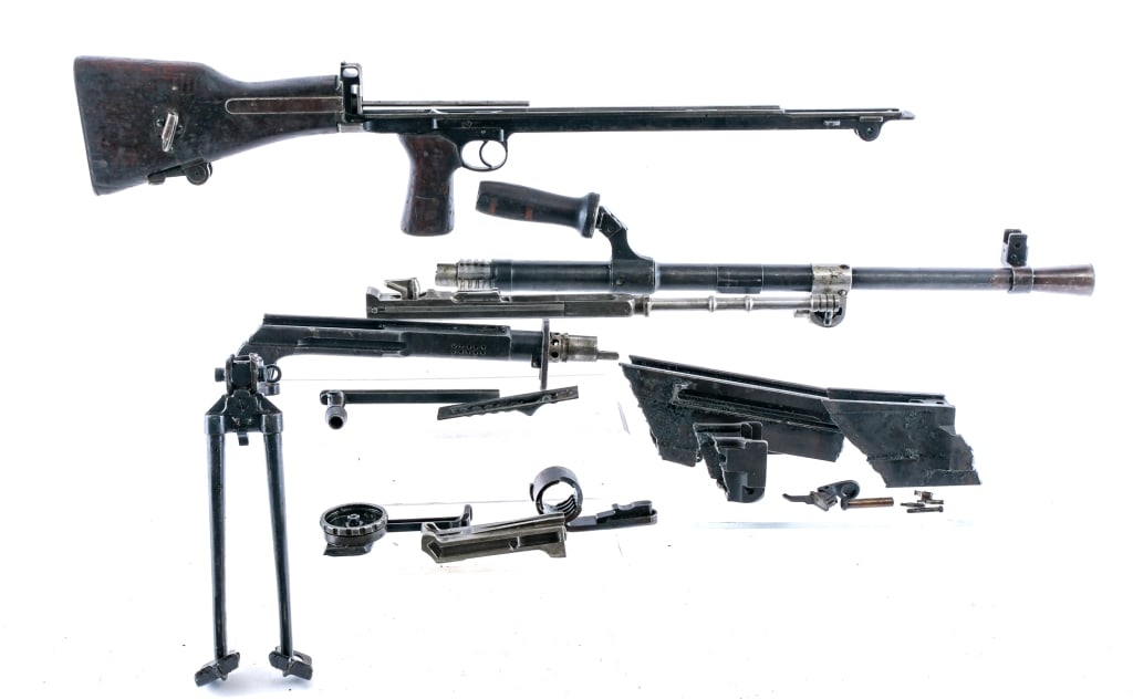 WWII British Bren LMG Parts Kit Live Barrel: Description WWII British Bren parts kit with live barrel, receiver pieces and all parts needed for repair or to make a nice display. Parts include complete MKI demilled receiver, complete lower, fcg,