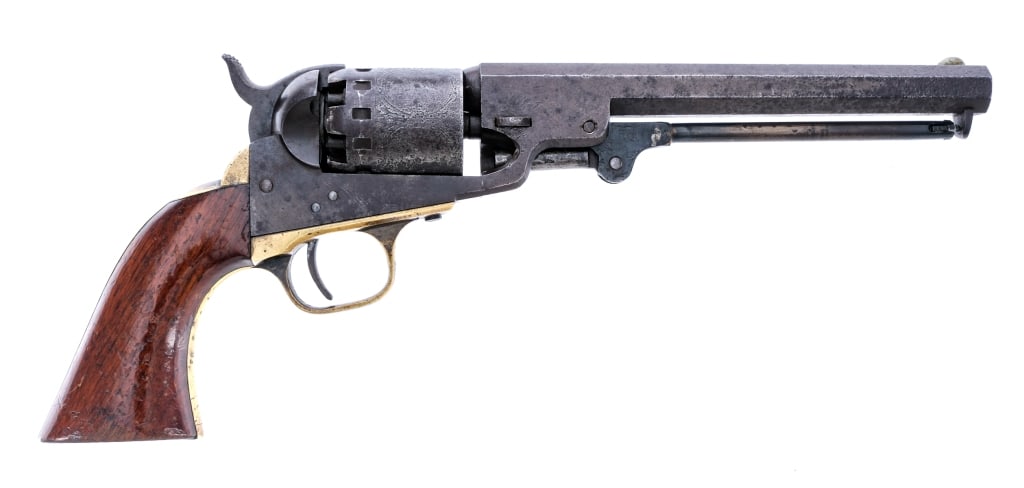 Manhattan Firearms Series III Navy .36 Revolver: Description Manhattan Firearms Company Series III Navy in .36 caliber with a six round capacity and a 6.5" octagon barrel. Made in Newark New Jersey between 1859-1868. Smooth wood grip plates. Finish 