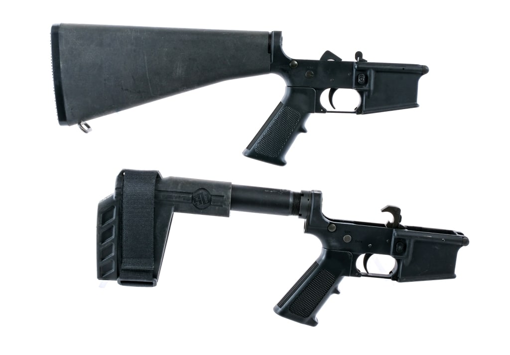 Stag Arms/Troy 5.56 Complete AR15 Lower Receivers: Description This lot is for two complete 5.56 AR15 Lower Receivers. First is a Stag Arms STAG-15 with black anodized forged aluminum, A2 pistol grip, and A2 fixed rifle stock. The second lower is a Tr