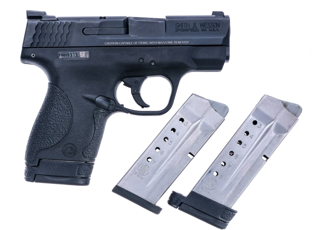 S&W M&P9 Shield 9mm Semi Auto Pistol: Description Smith & Wesson M&P9 chambered in 9mm with two, eight round magazines, one, seven round magazine, and a 3.1" barrel. Textured polymer frame. Polymer striker fired trigger with trigger shoe