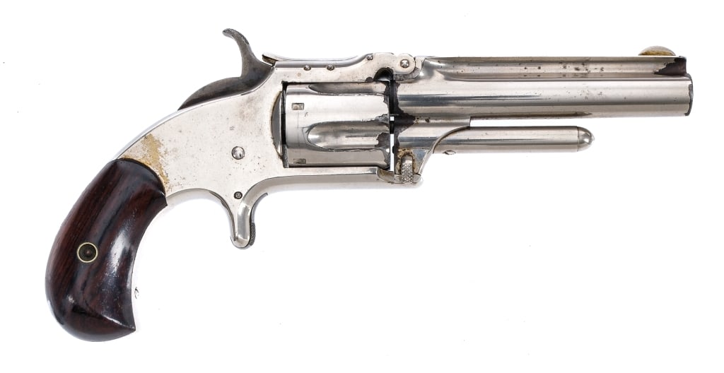 S&W No 1 1/2 NM 2nd Issue .32 RF Long Revolver: Description Smith & Wesson Model No. 1 1/2 New Model 2nd issue in .32 Rimfire Long with a five round capacity and a 3.5" barrel. Made in Springfield Massachusetts between 1868 and 1875. Smooth wood gr