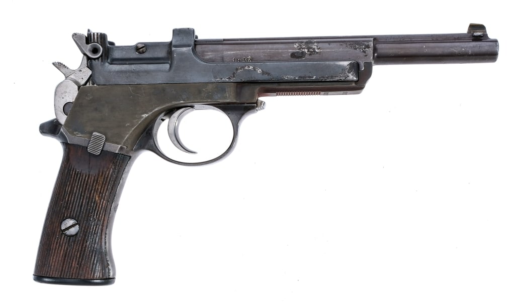 Steyr 1905 7.6mm Mannlicher Semi Auto Pistol: Description Steyr Model 1905 (Pocket Short Model ) in 7.6mm Mannlicher with a ten round capacity and a 6.25" barrel. Serrated wood grip plates. Blued frame, serrated slide and barrel. Unfinished steel