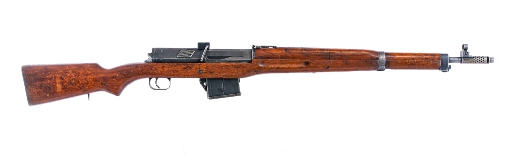 Egyptian Hakim 8mm Mauser Semi Auto Rifle: Description Egyptian Hakim chambered in 7.92x57mm (8mm Mauser) with one, ten round removable magazine and a 25.1" barrel with built in muzzle break. Imported by C.A.I. ST ALB VT, marked in small font