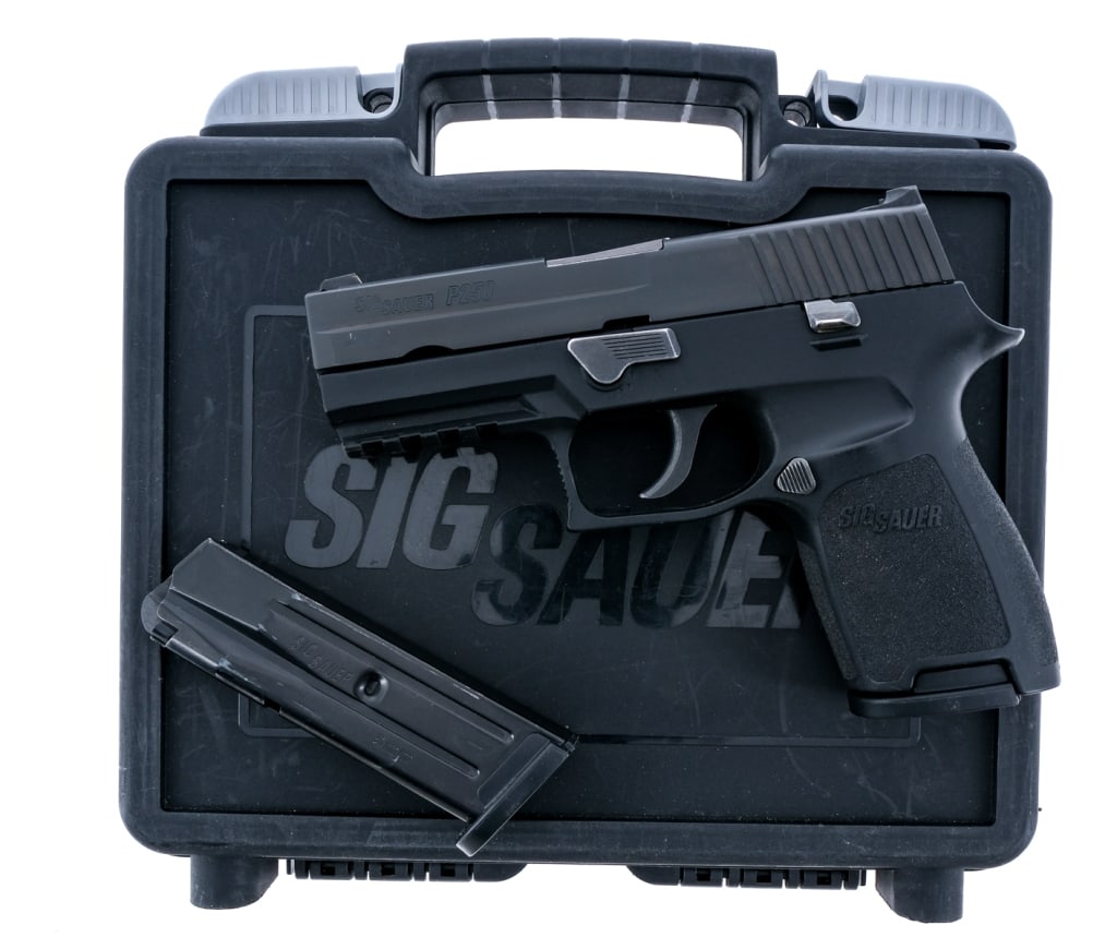 Sig Sauer P250 9mm Semi Auto Pistol: Description Sig Sauer P250 chambered in 9mm with two, ten round removable magazines and a 3.9" barrel. Black polymer frame with textured grip and front picatinny accessories rail. Double action only t