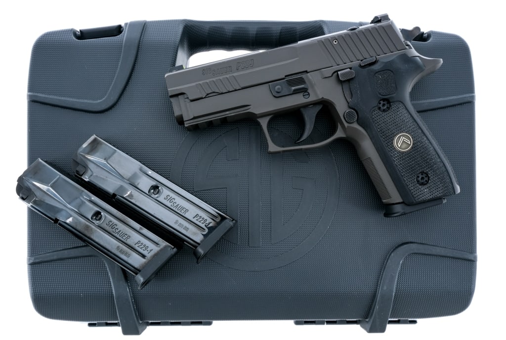 Sig Sauer P229 Legion 9mm Semi Auto Pistol: Description Sig Sauer P229 Legion chambered in 9mm with three, ten round removable magazines and a 3.9" carbon steel barrel. Legion gray finished alloy frame with checkered polymer G10 legion grips. P