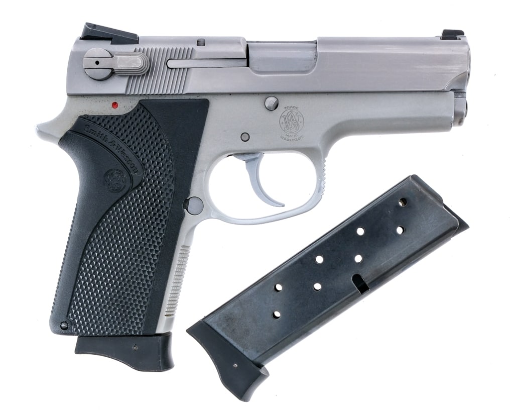 Smith & Wesson 3913 9mm Semi Auto Pistol: Description Smith & Wesson 3913 chambered in 9mm with two, eight round removable magazines and a 3.5" barrel. Aluminum alloy frame with checkered polymer grips. Double/single action trigger with bobbe