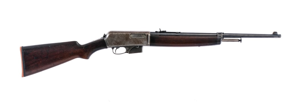 Winchester 1910 SL .401 Cal Semi Auto Rifle: Description Winchester 1910 Self Loading chambered in .401 caliber with a four round removable magazine capacity and a 20" barrel. Manufactured in 1917 with serial number 13908. Blued barrel, charger 
