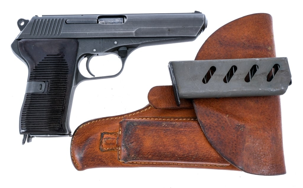 CZ VZ 52 7.62x25 Tokarev Semi Auto Pistol: Description CZ (Ceska Zbrojovka) VZ52 (Model 52) in 7.62x25mm Tokarev with one, eight round removable magazine and a 4.5" barrel. Made in the Czechoslovakia in 1955. Import marked on the right front o