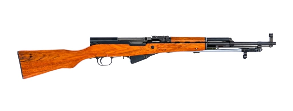 Chinese Type 56 SKS 7.62x39mm Semi Auto Rifle: Description Chinese Type 56 SKS chambered in 7.62x39mm with a ten round integral magazine and a 20" barrel. Imported by ARMCO, marked on the left side of the receiver. Front folding spike bayonet and