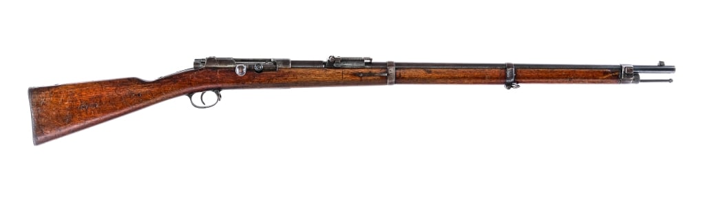 German Spandau 71/84 11mm Bolt Action Rifle: Description German Spandau Arsenal 71/84 chambered in 11mm with a eight round tubular magazine and a 31.6" barrel. Dated to 1888, marked on the side of the receiver. Front stacking prong and bayonet l