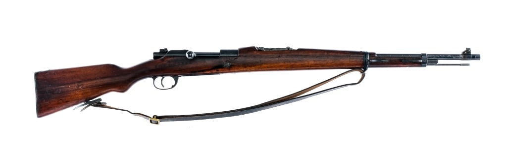 DWM Portuguese Mauser 1904/39 8mm Rifle: Description DWM Manufactured Portuguese Mauser Vergueiro M1904/39 chambered in 7.92x57mm (8mm Mauser) with a five round internal magazine and a 24" barrel. Originally chambered in 6.5, was rechambered