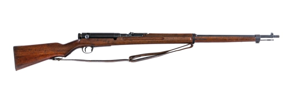 Koishikawa Type 38 Arisaka 6.5x50mm Rifle: Description Koishikawa Arsenal Type 38 Arisaka chambered in 6.5x50mm Arisaka with a five round integral magazine and a 31.5" barrel. Front bayonet lug and cleaning rod. Blued barrel, receiver, dust co