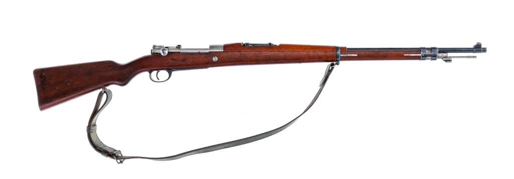 DWM Argentine Mauser 1909 7.65x53mm Rifle: Description DWM Argentine Mauser Modelo 1909 chambered in 7.65x53mm Argentine with a five round integral magazine and a 22" barrel. Import marked on the barrel. Front cleaning rod and bayonet lug. Unf