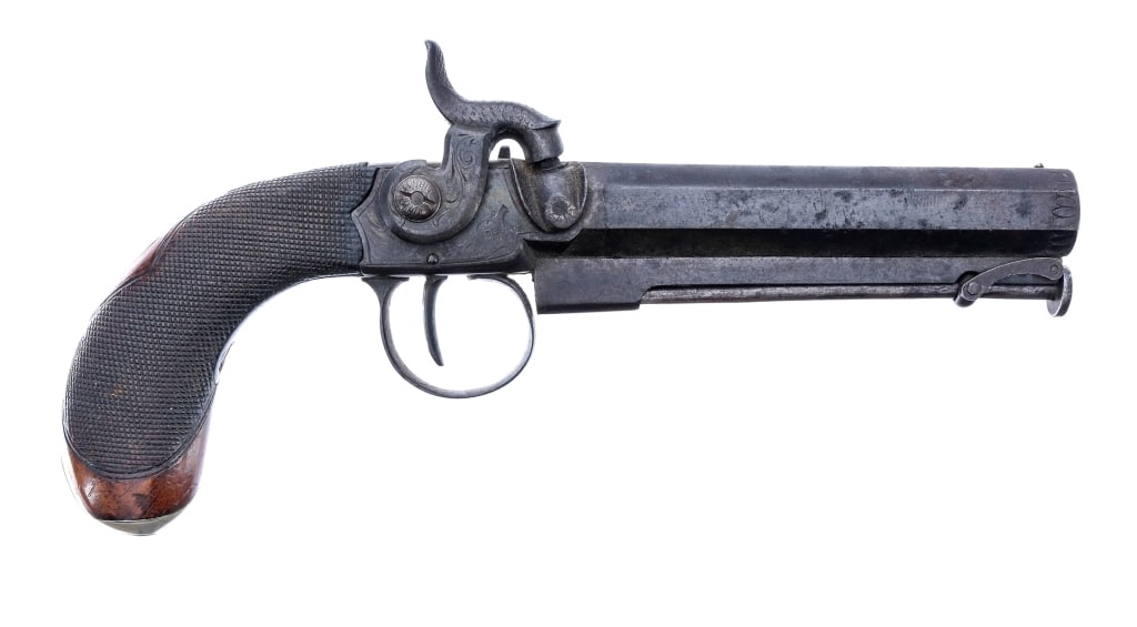 English .50 Belt Clip Percussion Pistol: Description English Belt Clip Percussion Pistol in .50 caliber with a single round capacity and a 5" octagon barrel. Nickel Silver butt plate and engraving plate. Checkered wood grip. Engraved trigger