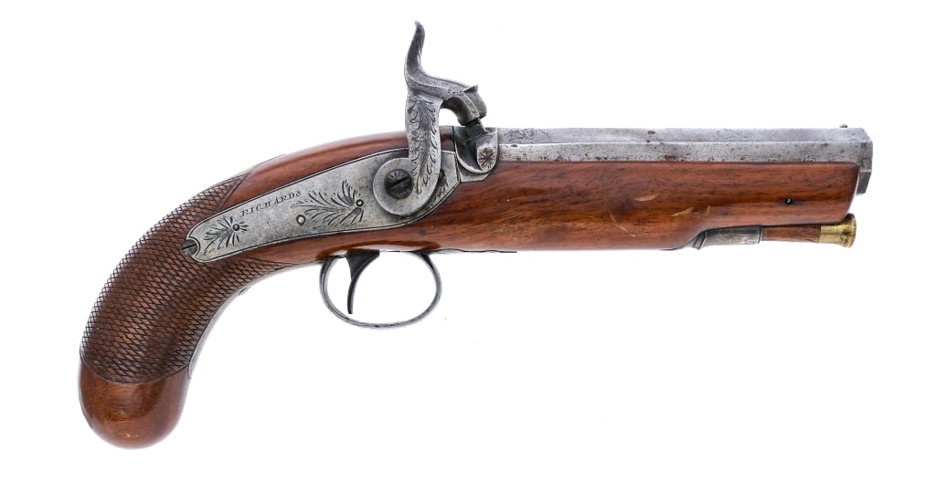 Westley Richards London .50 Percussion Pistol: Description Westley Richards London made percussion pistol in .50 caliber with a single round capacity and a 5" octagon barrel. Checkered wood stock. Finish worn engraved trigger guard, lock plate, ha