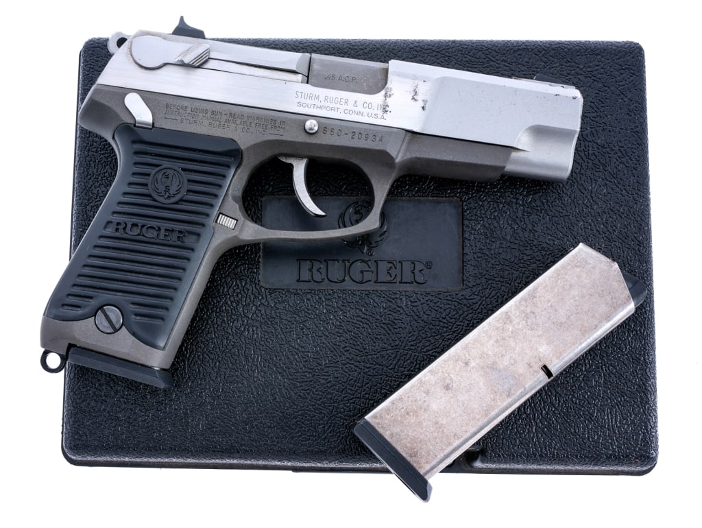 Ruger P90DC .45 ACP Semi Auto Pistol: Description Ruger P90 DC in .45 caliber with two, seven round removable magazine and a 4.5" barrel. Made in Southport Connecticut in 1991. Serrated composite grip plates. Matte finished frame and matt