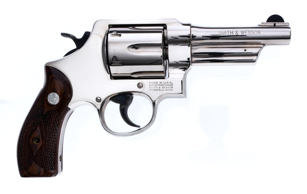 Smith & Wesson 21-4 .44 S&W Spl Revolver: Description Smith & Wesson 21-4 Reintroduction in .44 S&W Special with a six round capacity and a 4" barrel. Limited Production of 250 in Nickel finish made in 2006. Checkered laminated wood grip plat