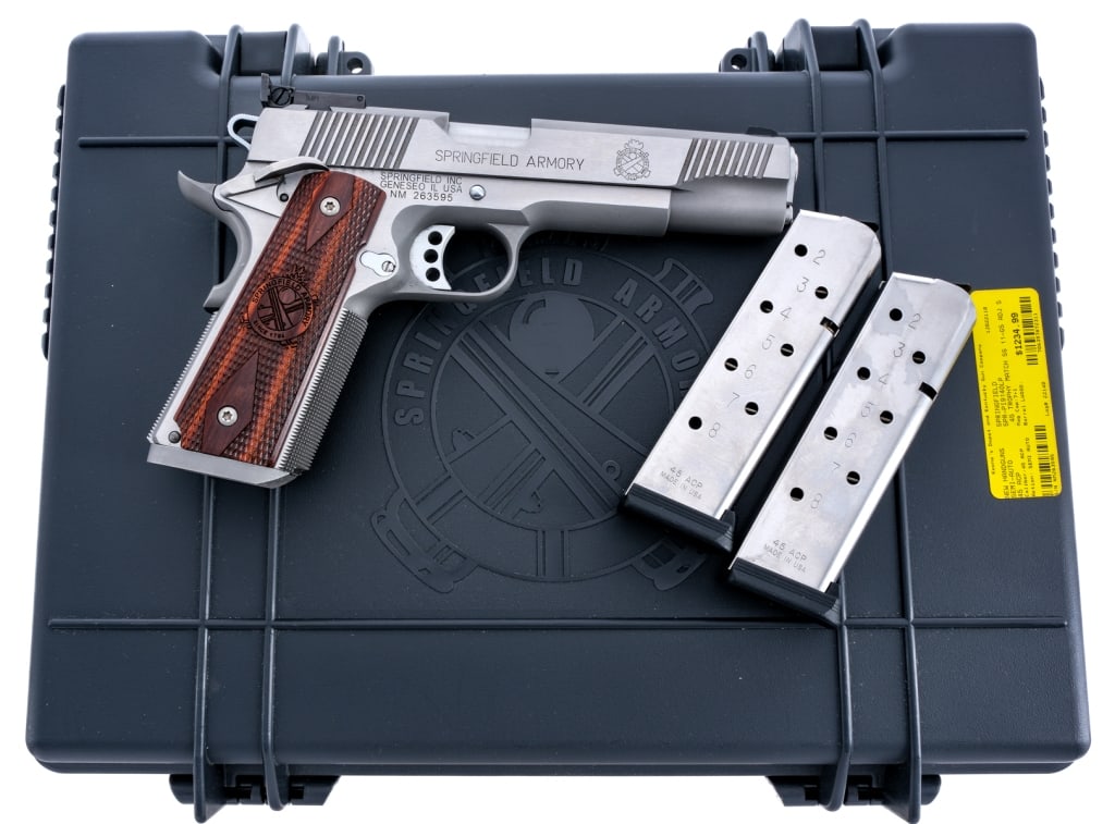Springfield Trophy Match .45 ACP Semi Auto Pistol: Description Springfield Armory Trophy Match in .45 ACP with two, eight round removable magazines and a 5" barrel. Checkered wood grip plates. Knurled stainless steel frame, barrel and serrated slide. 
