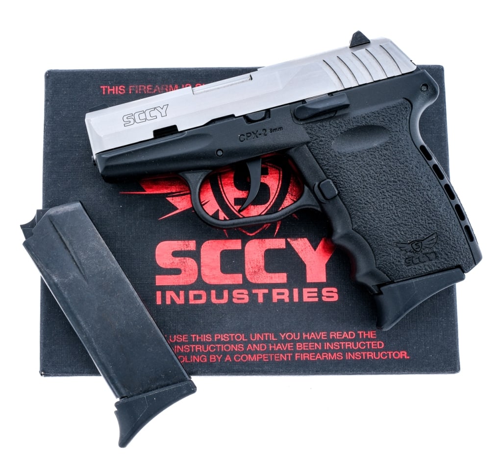 SCCY CPX-2 TT 9mm Semi Auto Pistol: Description SCCY CPX-2 Two Tone chambered in 9mm with two, ten round removable magazines and a 3" barrel. Textured polymer frame with finger grooves. Double action only trigger. Stainless steel serrat