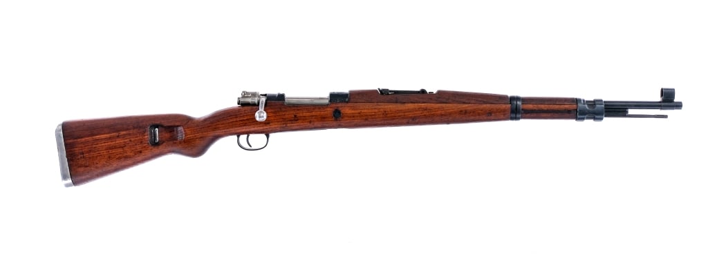 Mitchells Mausers Yugoslavian M48 8mm Bolt Rifle: Description Mitchells Mausers Yugoslavian M48 in 8mm with a five round capacity and a 23.5" barrel. Made in Yugoslavia in 1944 then taken and refinished by Mitchells Mausers in the USA. Import marked