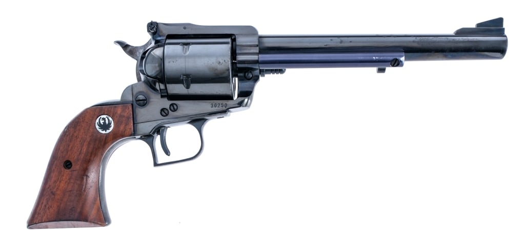 Ruger Super Blackhawk .44 Mag Revolver: Description Ruger Super Blackhawk in .44 Magnum with a six round capacity and a 7.5" barrel. Made in Southport Connecticut in 1968. Smooth wood grip plates. Blued trigger guard, serrated trigger, fram