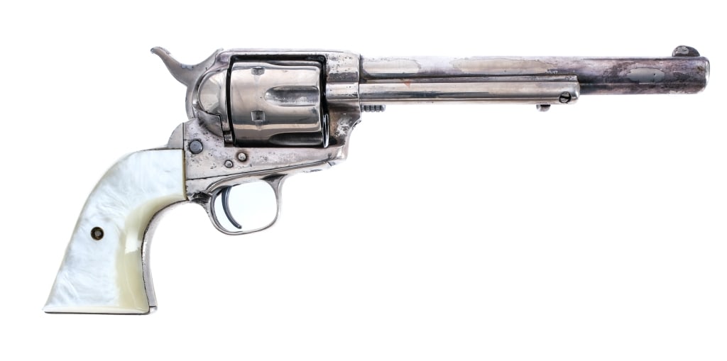 Colt Single Action Army .45 LC Revolver: Description Colt Single Action Army in .45 Long Colt with a six round capacity and a 7" barrel. Made in Hartford Connecticut in 1876. Faux Mother of Pearl grip plates. Nickel finished trigger guard, f