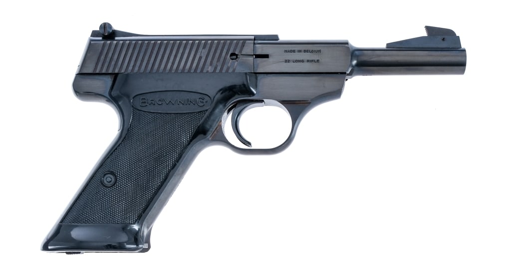 Browning Nomad .22 LR Semi Auto Pistol: Description Browning Nomad in .22 Long Rifle with one, ten round removable magazine and a 4.5" barrel. Made in Belgium in 1969. Checkered black composite grip. Blued frame, trigger, serrated slide and