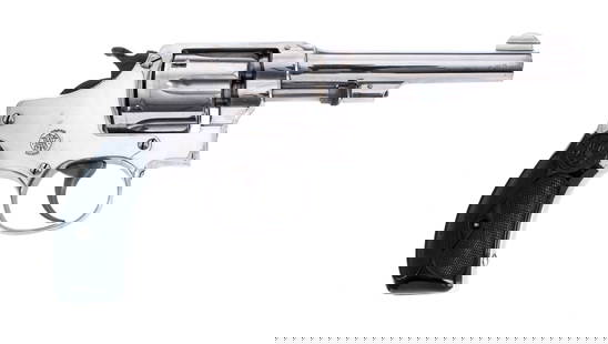Smith & Wesson M1903 .32 Long Revolver: Description Smith & Wesson Hand Ejector Model of 1903 in .32 S&W Long with a six round capacity and a 4.25" barrel. Made in Springfield Massachusetts between 1904-1906. Checkered black S&W composite g
