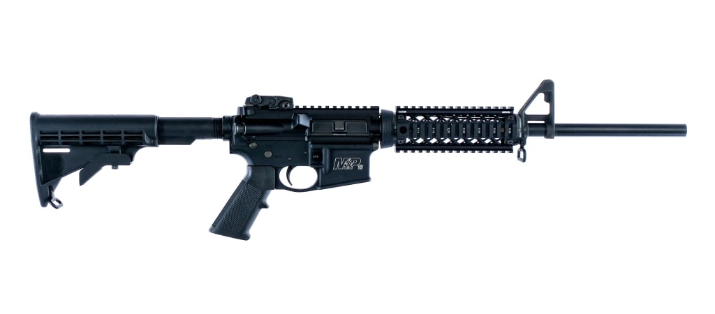 S&W M&P 15 5.56x45mm Semi Auto Rifle: Description Smith & Wesson M&P 15 chambered in 5.56x45mm NATO with a 16" 1/9 twist featureless barrel. Front A2 style front gas block with adjustable front sight post. Blackhawk quad picatinny handgua