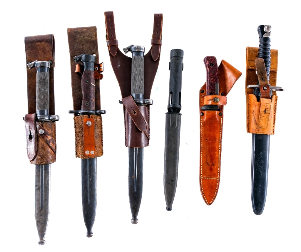 Bayonets 6 Pcs Lot Bayonet: Description This lot is for six assorted bayonets. Three Swedish Mauser Model 1896 bayonets with 8"blades and leather sheaths. Swiss made Model 1957 bayonet with 9.5" blade, composite scabbard with le