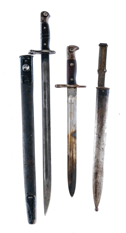 American Bayonets 2 Pcs Lot Bayonet: Description This lot is for two United States rifle bayonets. Springfield Armory U.S. Model 1892 Krag Jorgensen Rifle Bayonet with 11.5" blade and metal scabbard. Ricasso is marked U.S. 1902. Remingto