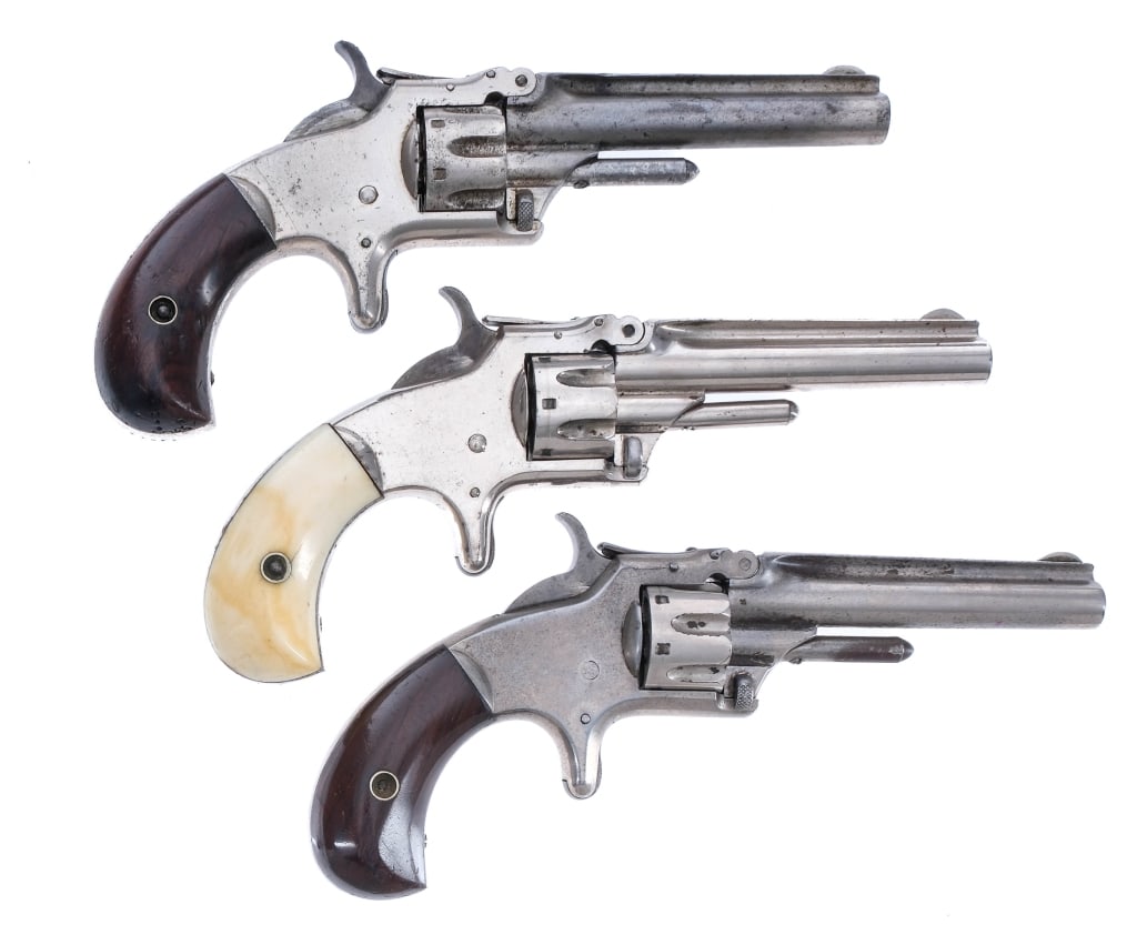 S&W #1 3rd Issue .22 RF Short 3 Pcs Revolver: Description This lot is for three Smith & Wesson Model Number 1 3rd Issue revolvers in .22 Rimfire Short. Made in Springfield Massachusetts between 1868 and 1881. Two of them have smooth wood grip pla