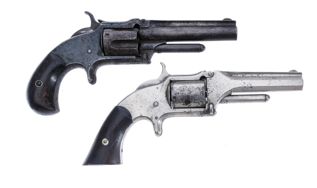 S&W 1 1/2 Old/New .32 RF Long 2 Pcs Lot Revolver: Description This lot is for two Smith & Wesson Model 1 1/2 in .32 Rimfire Long. S&W Model 1 1/2 Old in .32 Rimfire Long with a five round capacity and a 3.5" barrel. Smooth wood grip plates with match